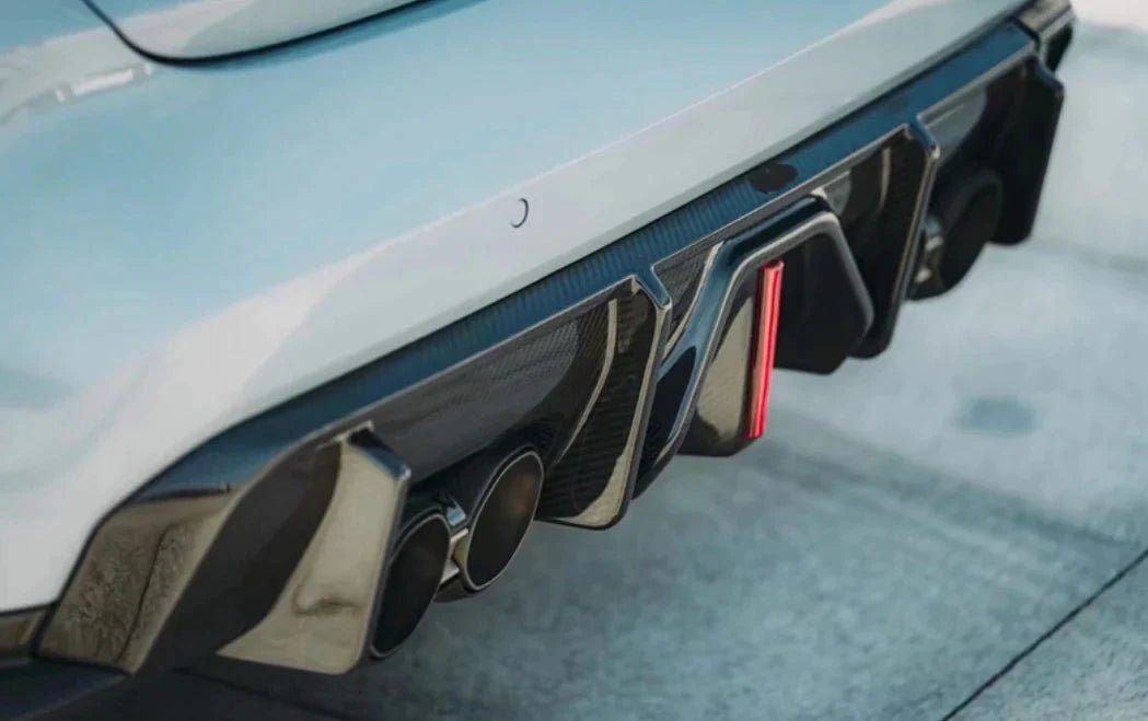 2021+ BMW M3/M4 Carbon Fiber AK Style Diffuser with LED Brake Light | G80/G82/G83.