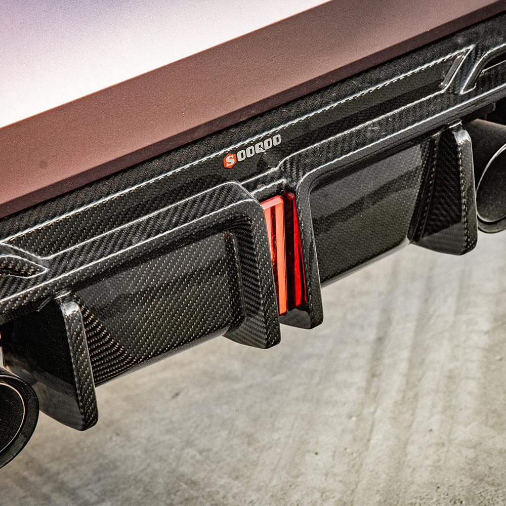 SOOQOO V1 BMW M4 G82 Rear Diffuser W/Brake Light In Prepreg Carbon Fiber — product view 6