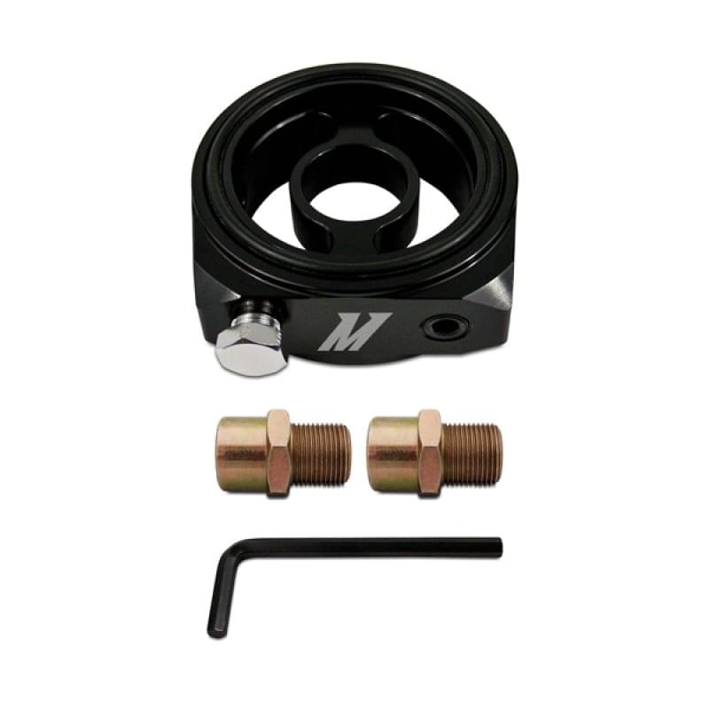 Mishimoto Oil Sandwich Plate Adapter with 3 x 1/8in NPT Ports.