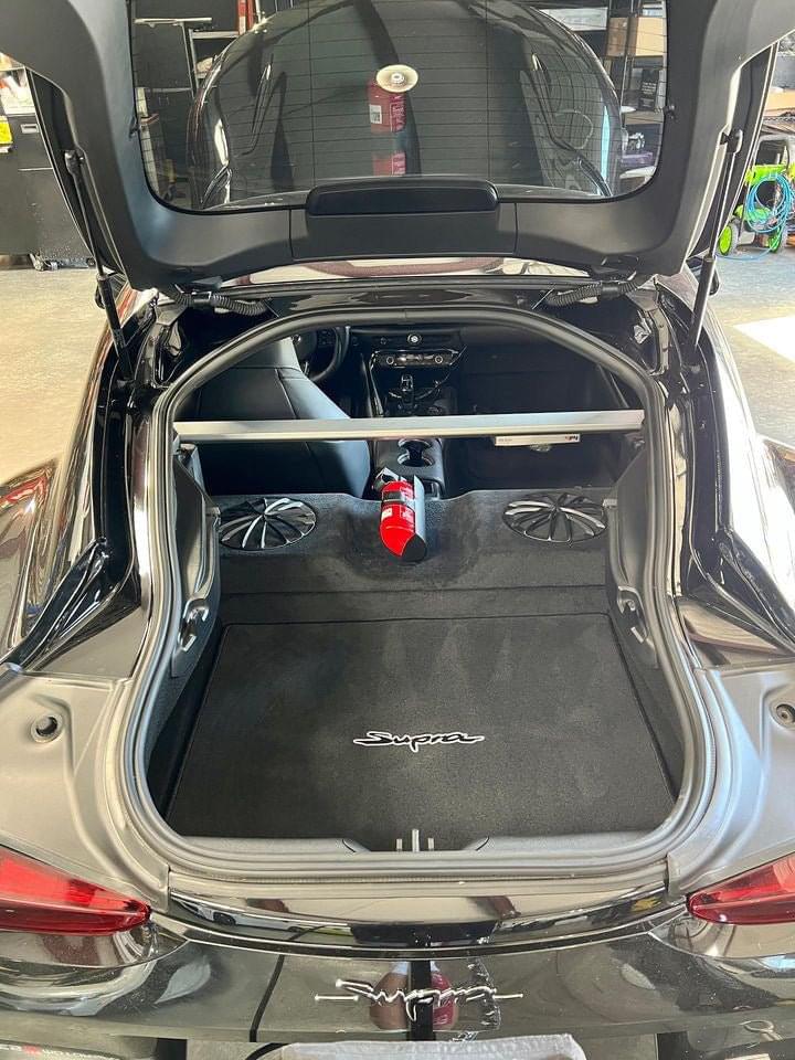 A90/A91 Toyota Supra OEM BMW Fire Extinguisher kit.