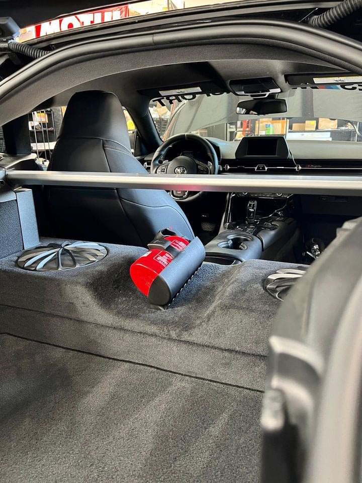 A90/A91 Toyota Supra OEM BMW Fire Extinguisher kit.