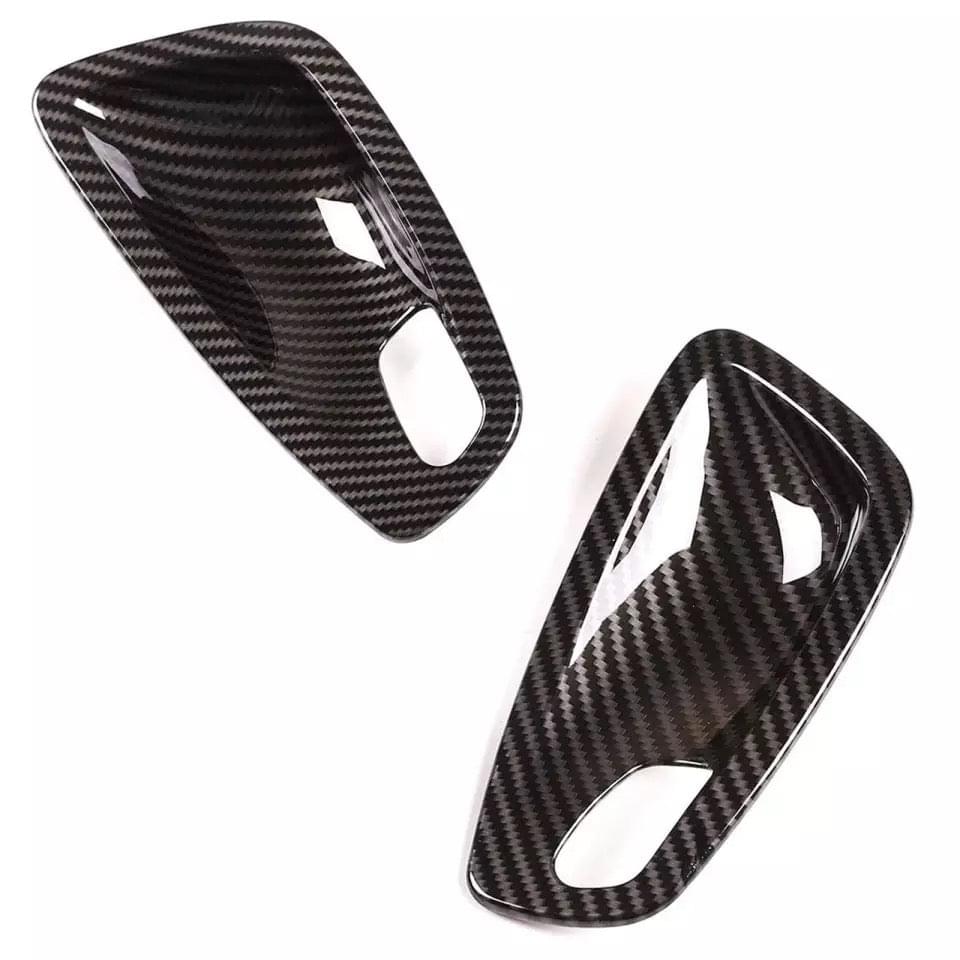 E9X CARBON FIBER DOOR HANDLE COVERS.