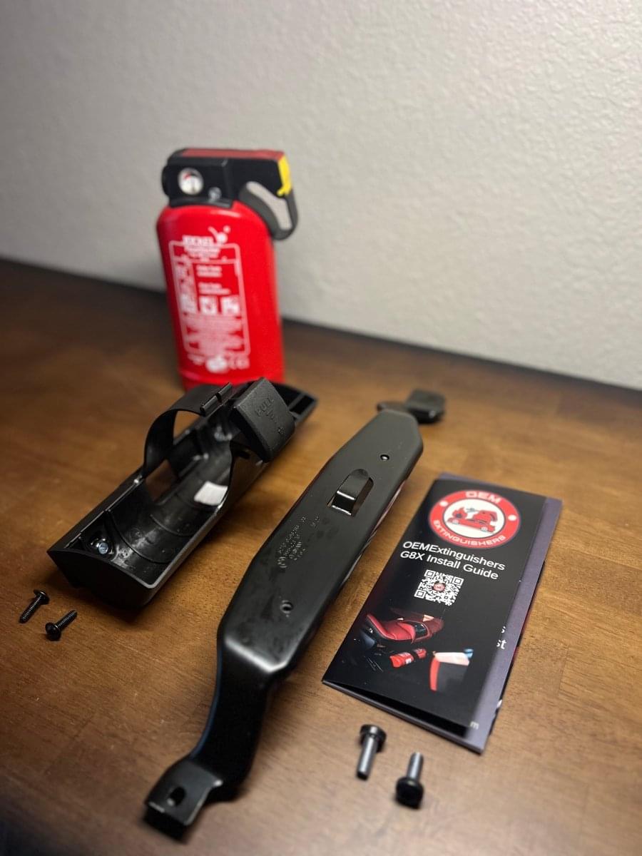 F90 M5 and X5M OEM Fire Extinguisher Kit.