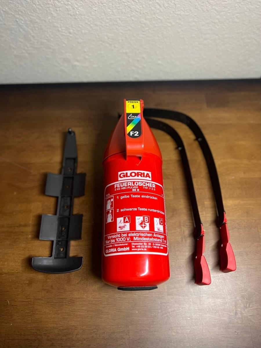 OEM BMW M4 GTS Fire Extinguisher Kit.