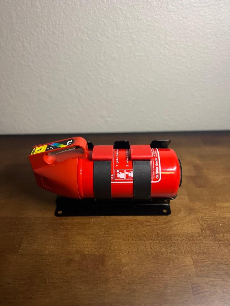 OEM BMW M4 GTS Fire Extinguisher Kit.