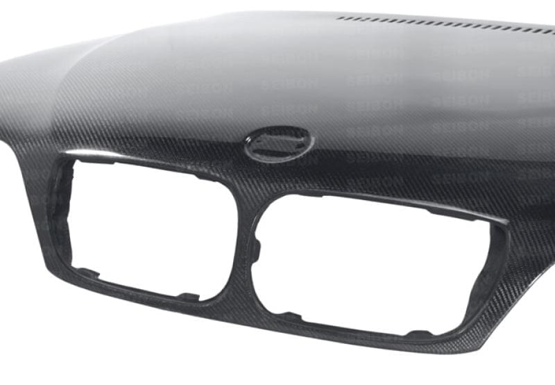 Seibon 02-05 BMW 3 Series 4dr E46 (Manuf Date 7/02-7/06 Models Only) OEM-Style Carbon Fiber Hood.