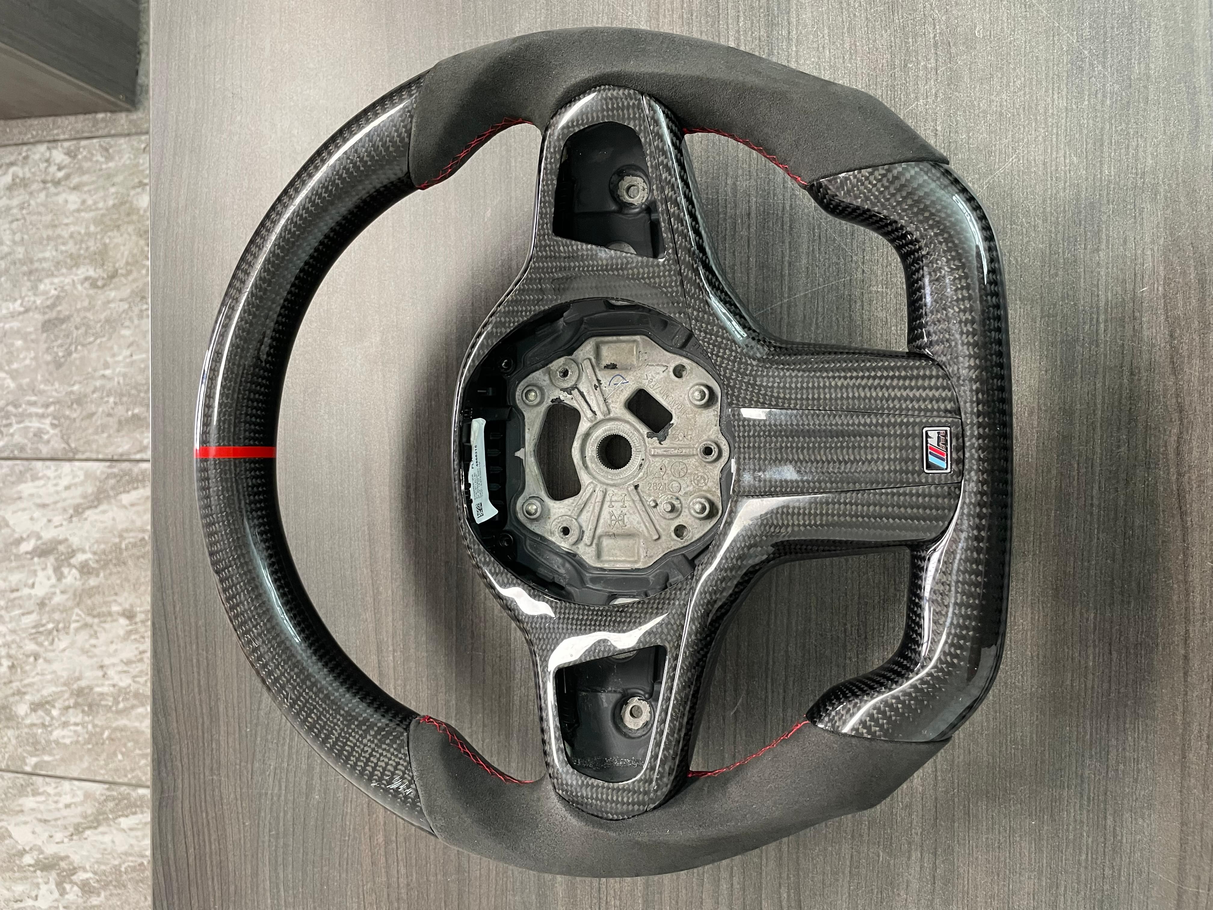 G8X Carbon Steering Wheel (slight damage).