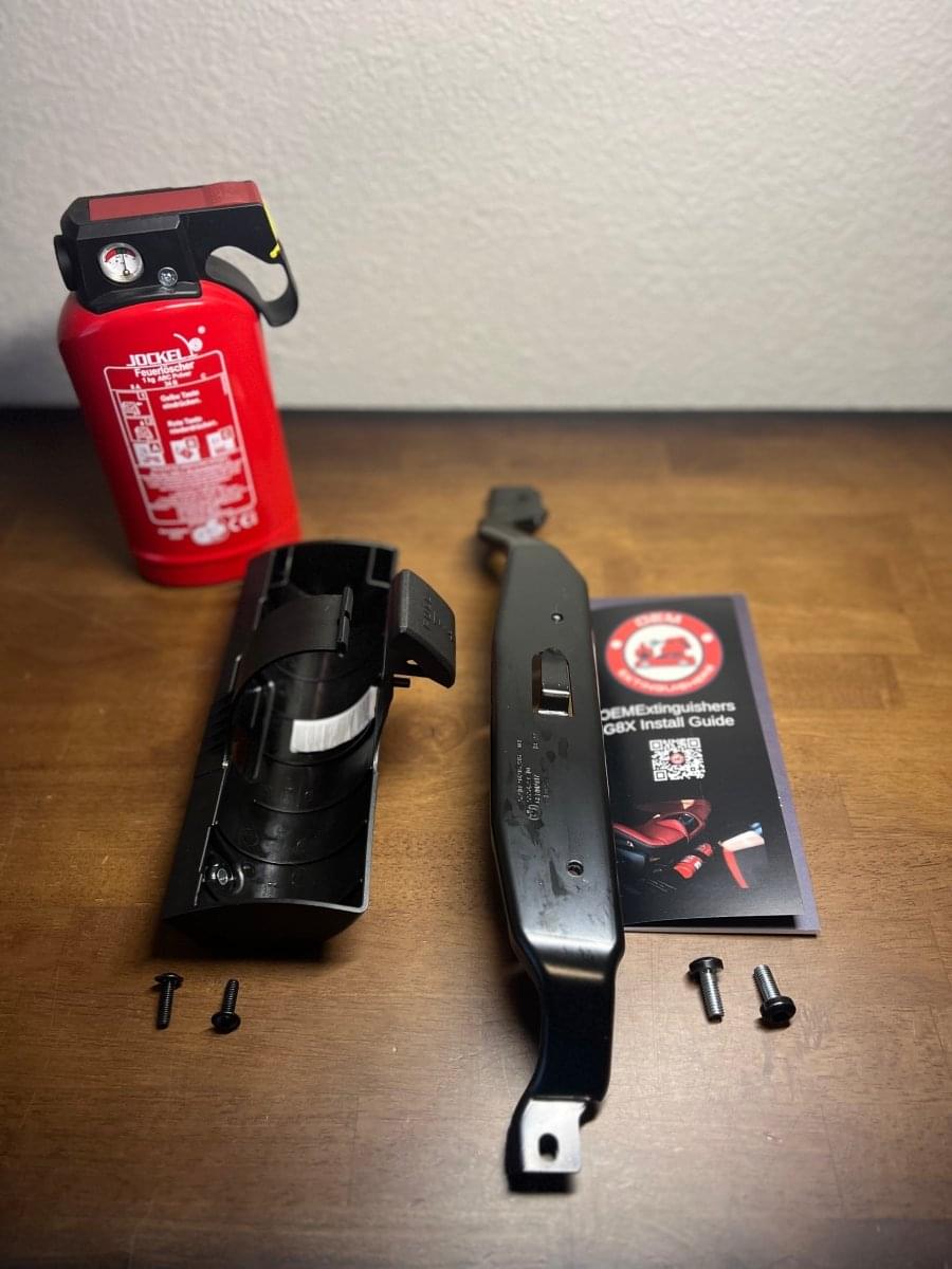 F90 M5 and X5M OEM Fire Extinguisher Kit.