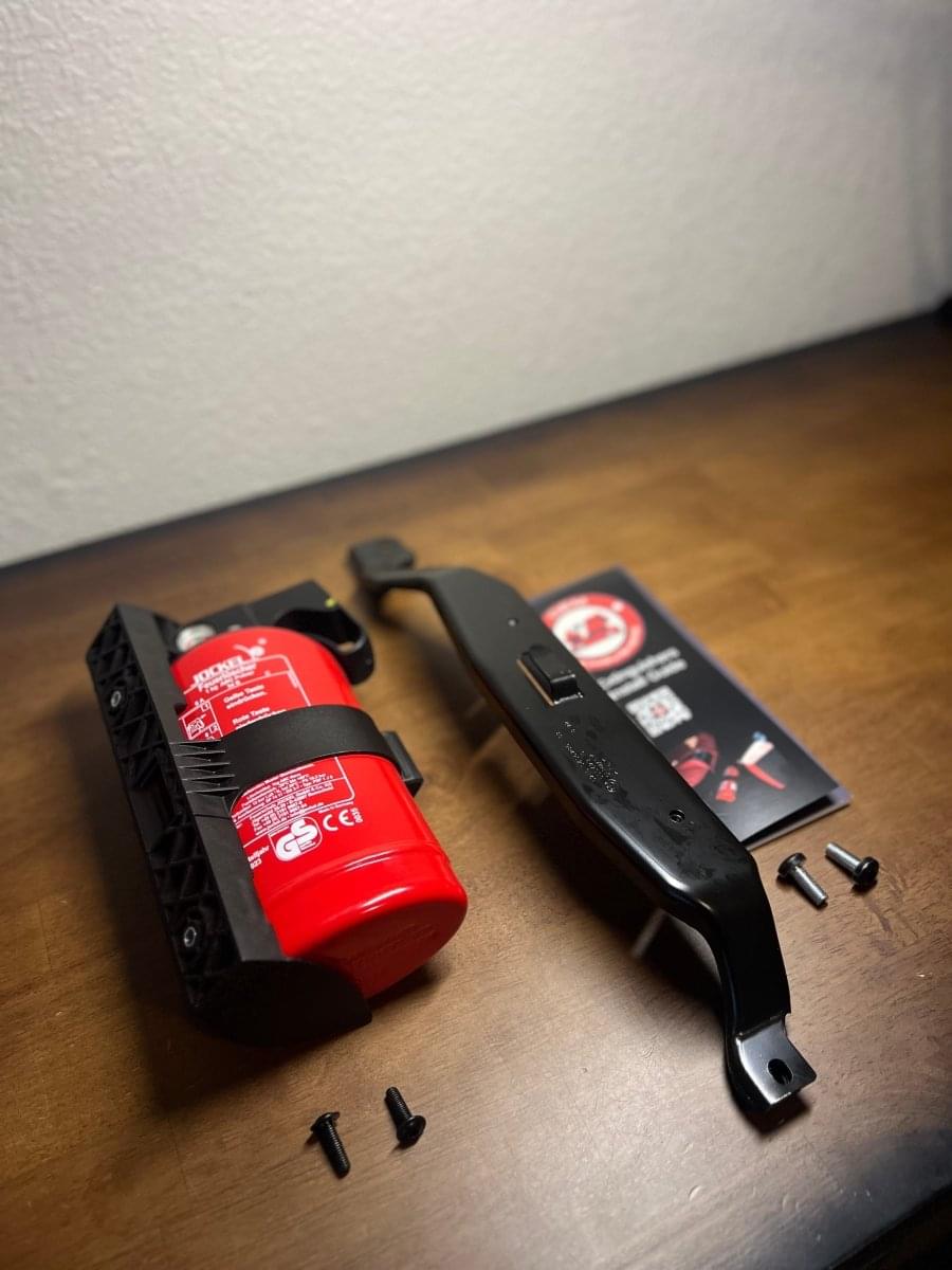 F90 M5 and X5M OEM Fire Extinguisher Kit.