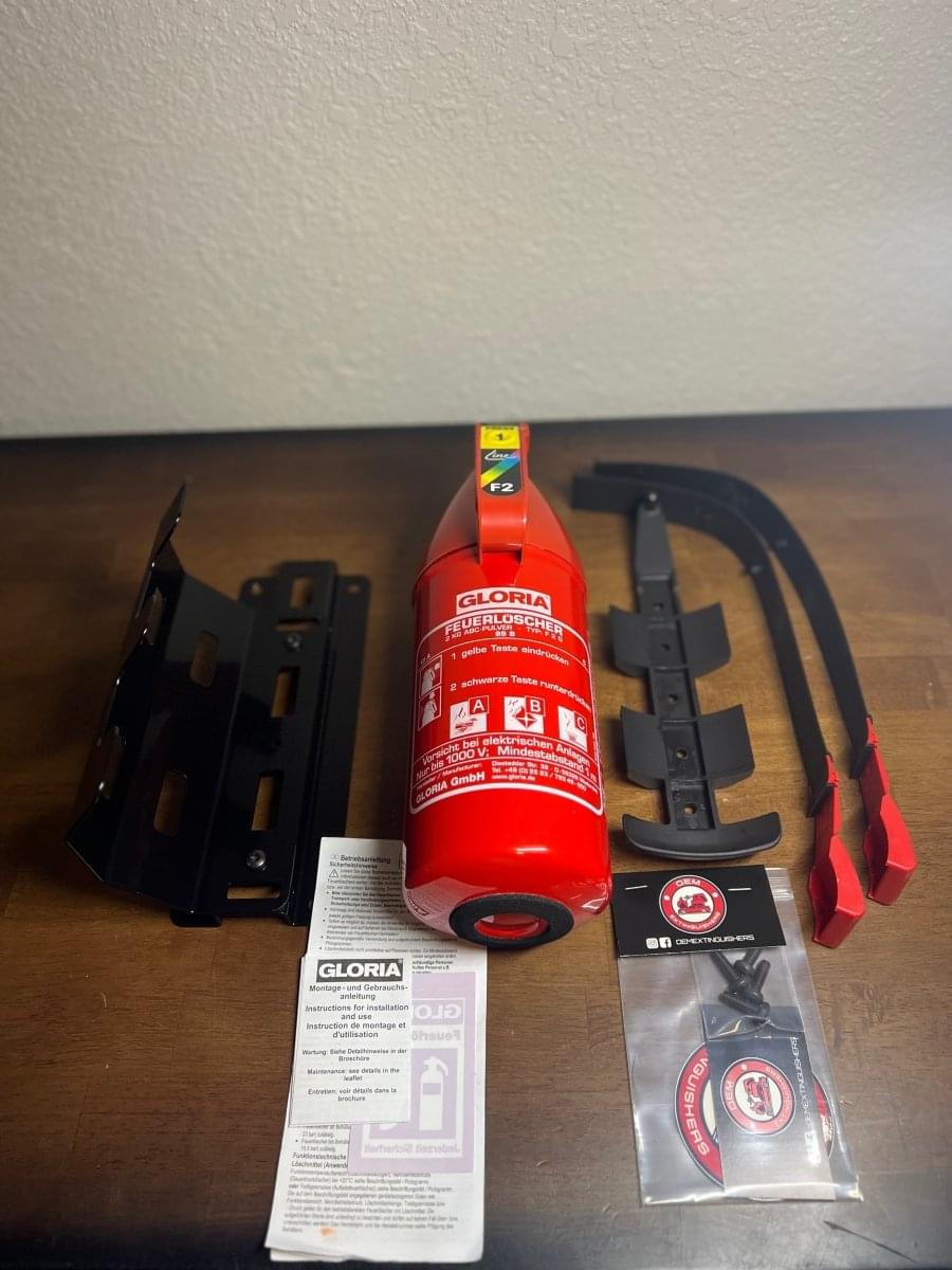 OEM BMW M4 GTS Fire Extinguisher Kit.