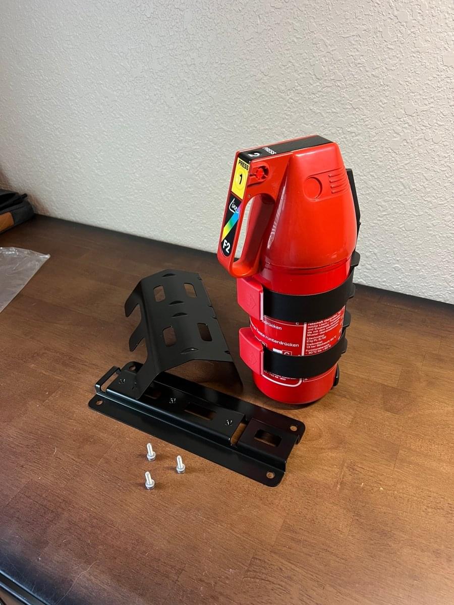 OEM BMW M4 GTS Fire Extinguisher Kit.